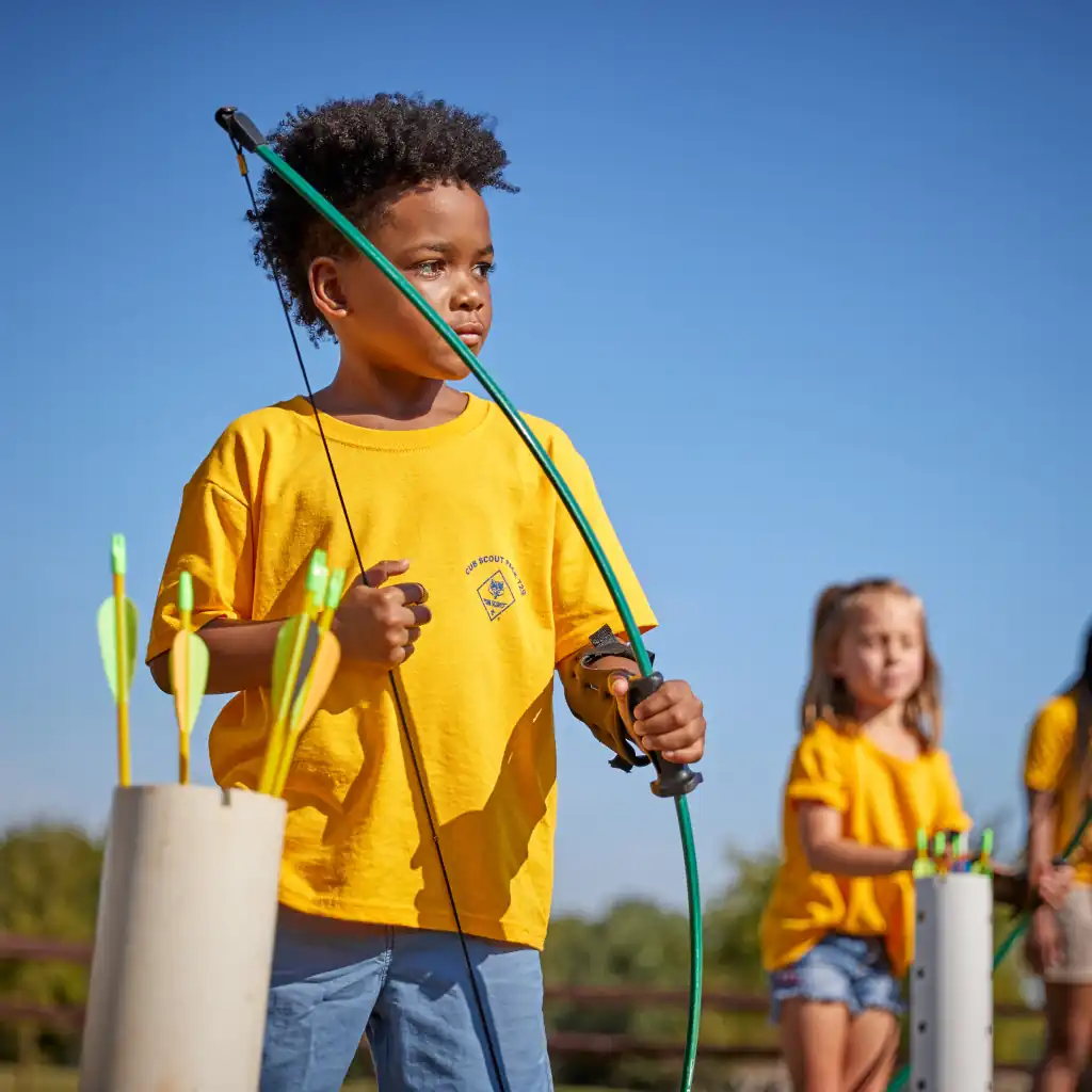 cub scouts at the archery range