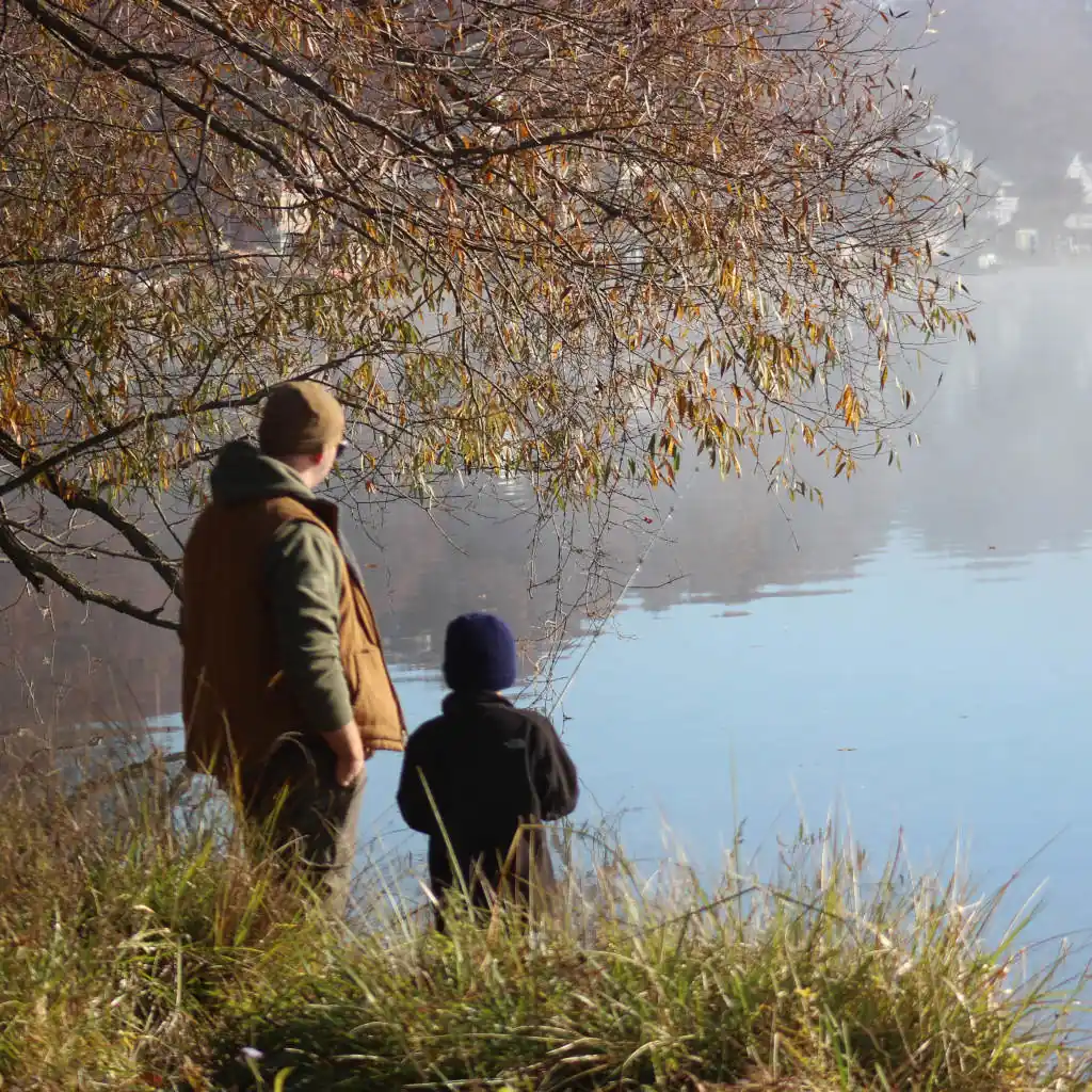 Cub Scout and father fishing at Camp Teetonkah